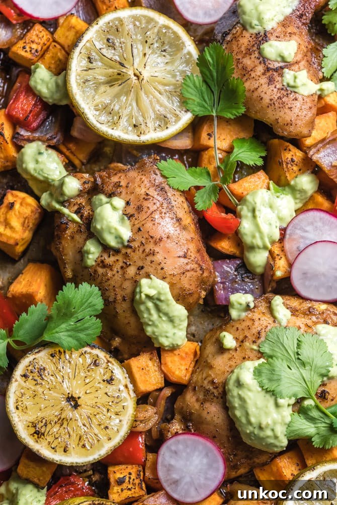 Chili-lime chicken and sweet potatoes with creamy avocado cilantro sauce.