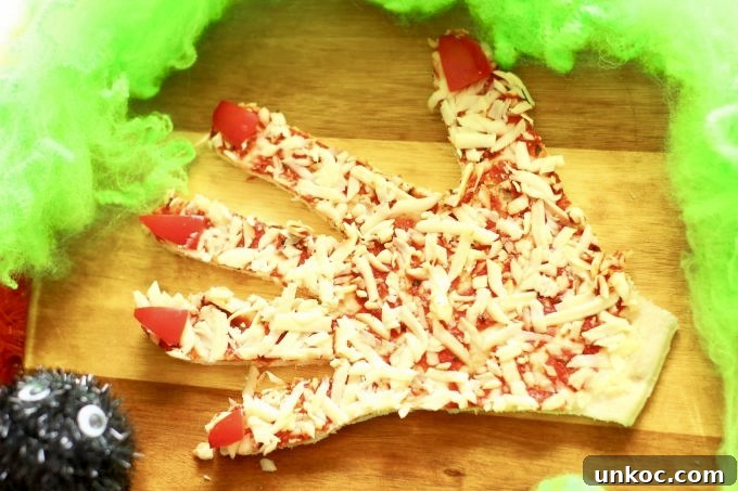 Halloween pizza hand idea