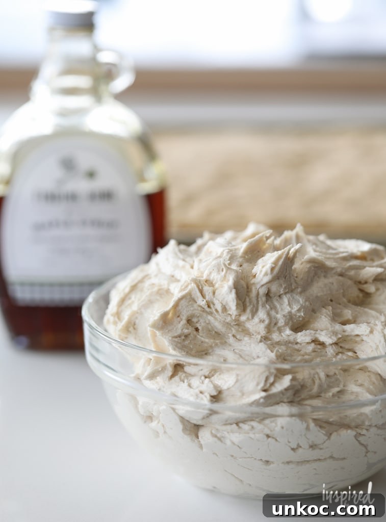 Maple buttercream frosting for pumpkin cookie bars.