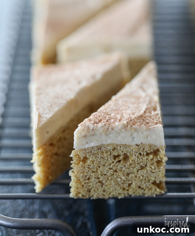 Sliced pumpkin cookie bars with maple buttercream frosting.