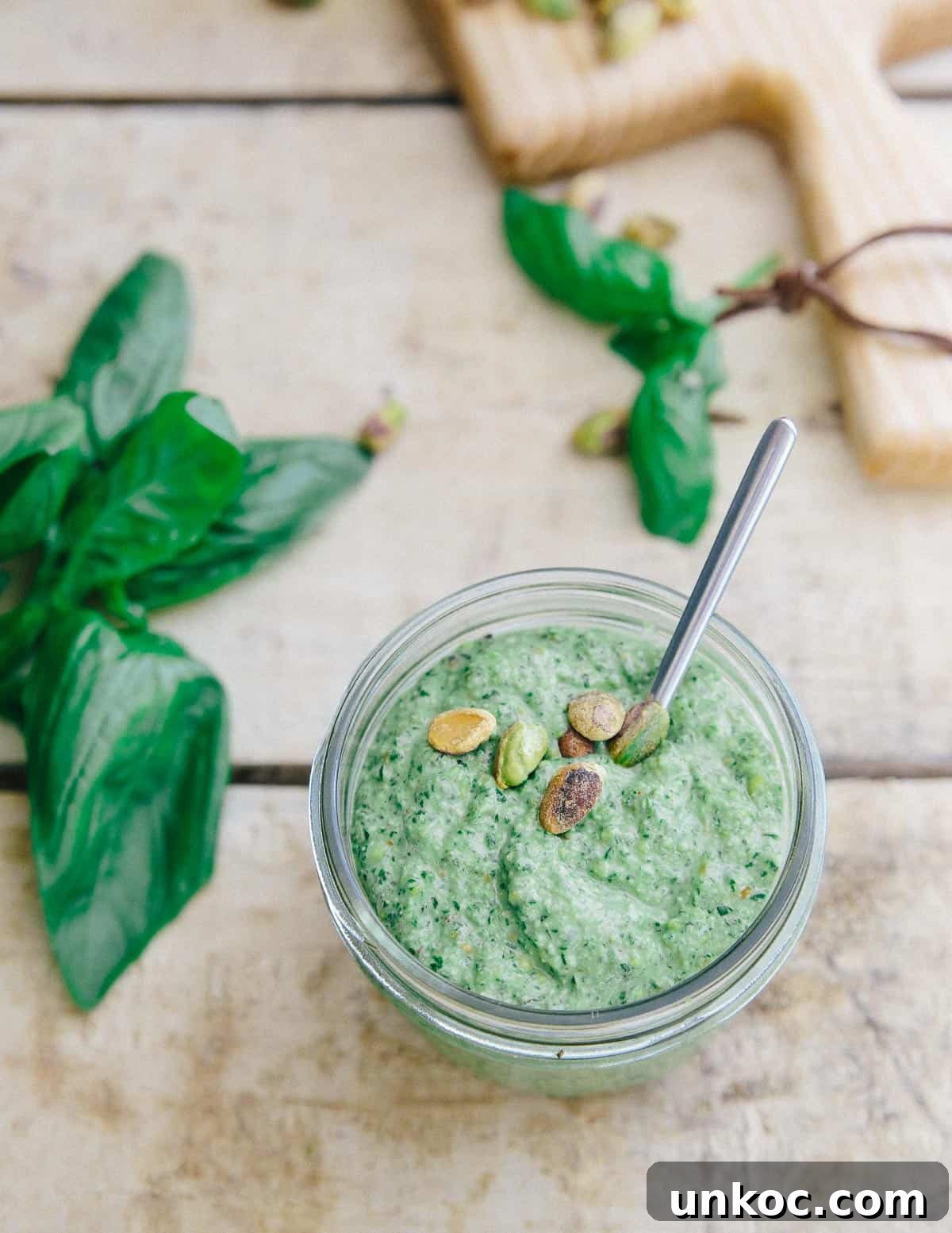 This tangy basil pesto is the base for this Skillet Zucchini Pesto Pizza and then drizzled on top for even more summer deliciousness!