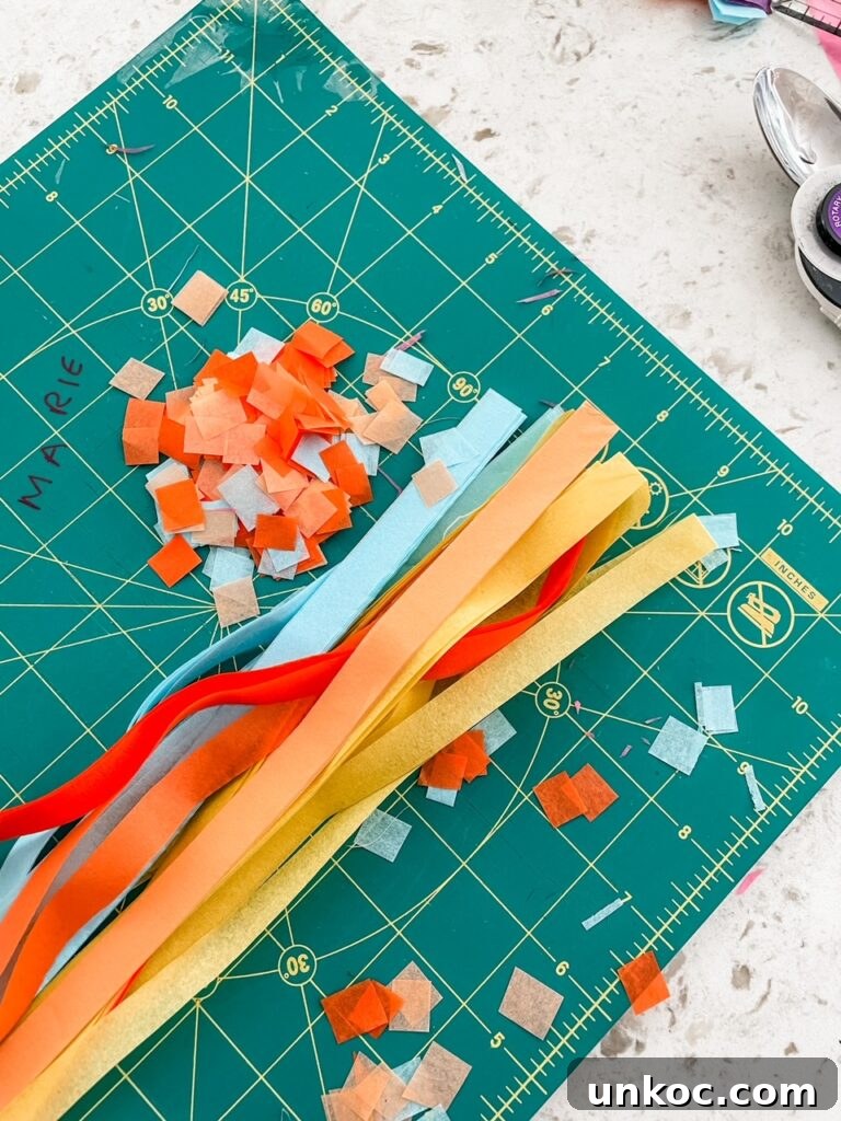 DIY Confetti Easter Eggs for Easter Crafts 8 Strips of paper being used to make the confetti squares
