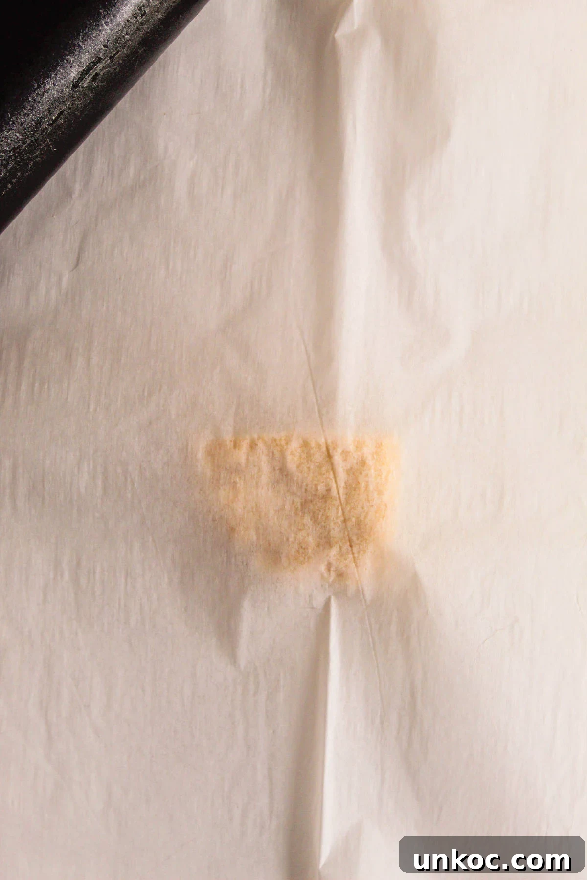 Soft Keto Almond Flour Tortillas That Fold Without Cracking 11 One of the Divided Dough Placed between two Parchment Papers
