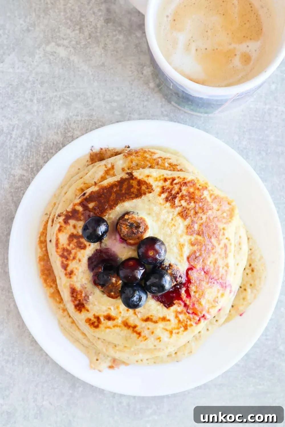 Flourless Blueberry Oatmeal Pancakes No Banana 5 Flourless blueberry oatmeal pancakes with oats and yogurt for an easy healthy breakfast.