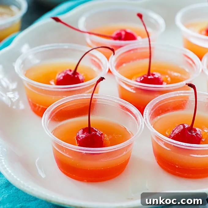 Pineapple Upside-Down Cake Jello Shots for Summer Parties 2 Pineapple Upside Down Jello Shots
