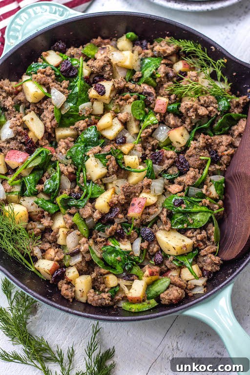 Whole30 Breakfast Skillet with Sausage and Cranberries Whole30 breakfast skillet made with sausage, potatoes, spinach, and cranberries