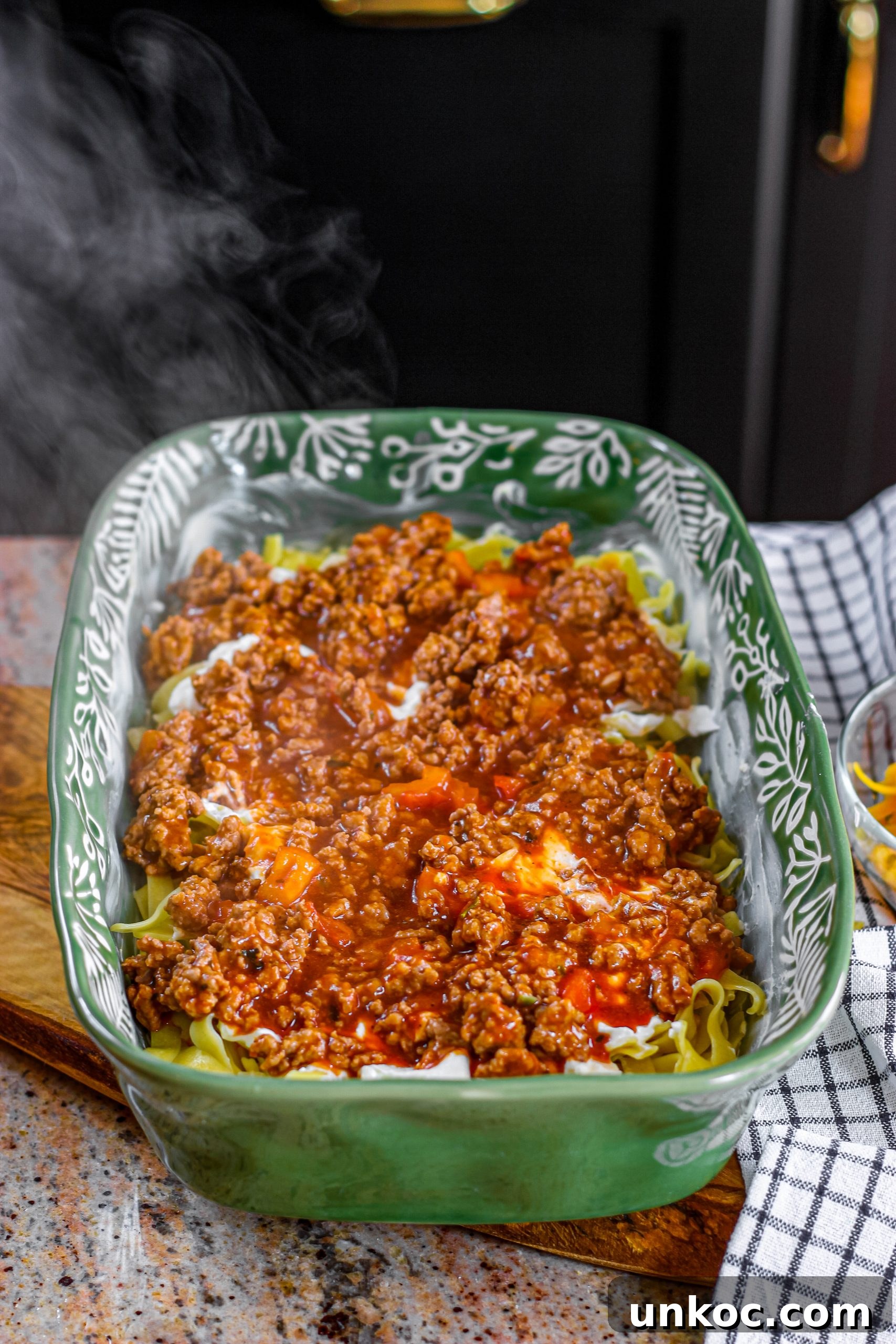 Poor Mans Husband Casserole with Ground Beef 13 Second layer of meat sauce on casserole
