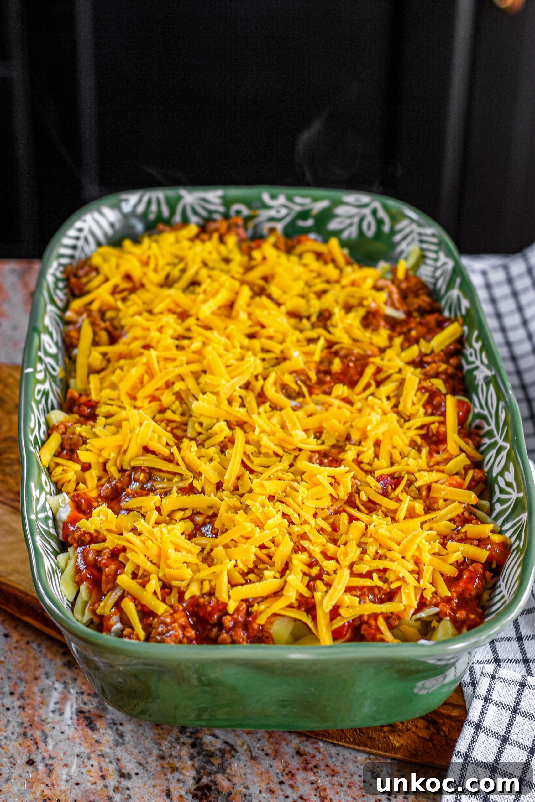 Poor Mans Husband Casserole with Ground Beef 14 Shredded cheese topping on Poor Man Husband Casserole