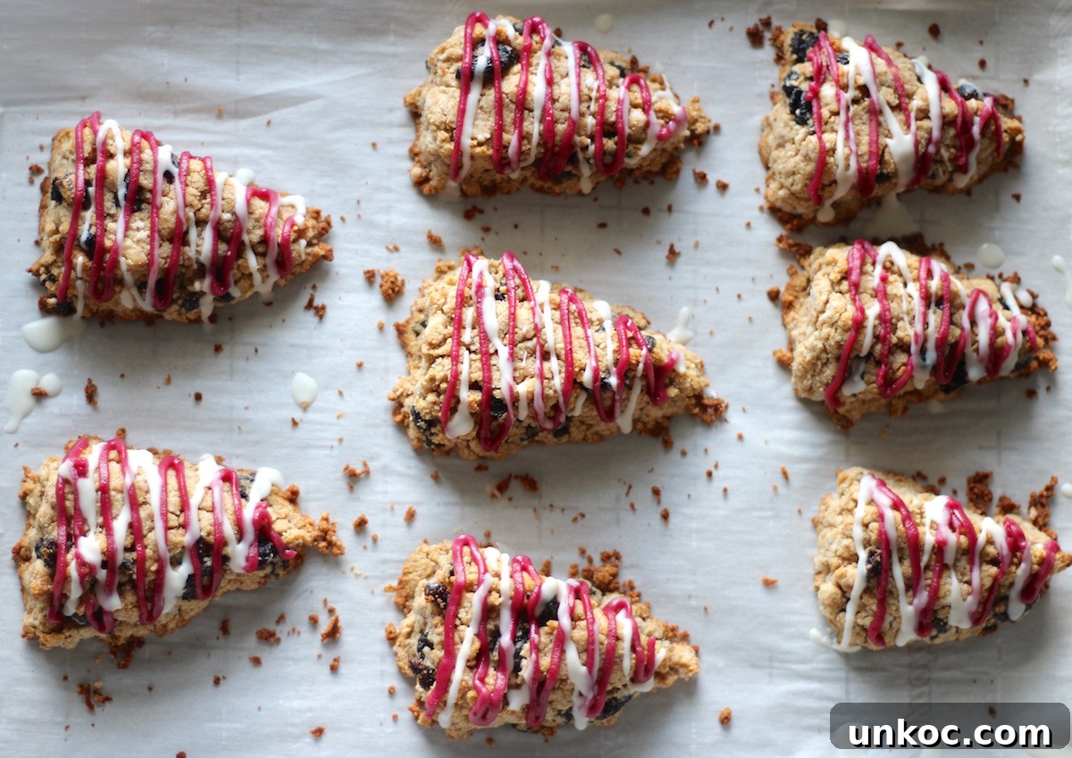 Paleo Frosted Cherry Scones (AIP) - an allergy-friendly scone that is tender and full of cherry and almond flavor, thanks to dried cherries and a cherry coconut butter glaze! | fedandfulfilled.com