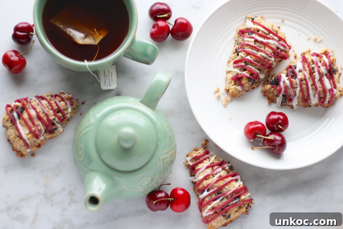 Paleo Frosted Cherry Scones (AIP) - heavenly cherry coconut butter scones are drizzled with two tasty frostings for a delicious treat to enjoy with your tea! | fedandfulfilled.com