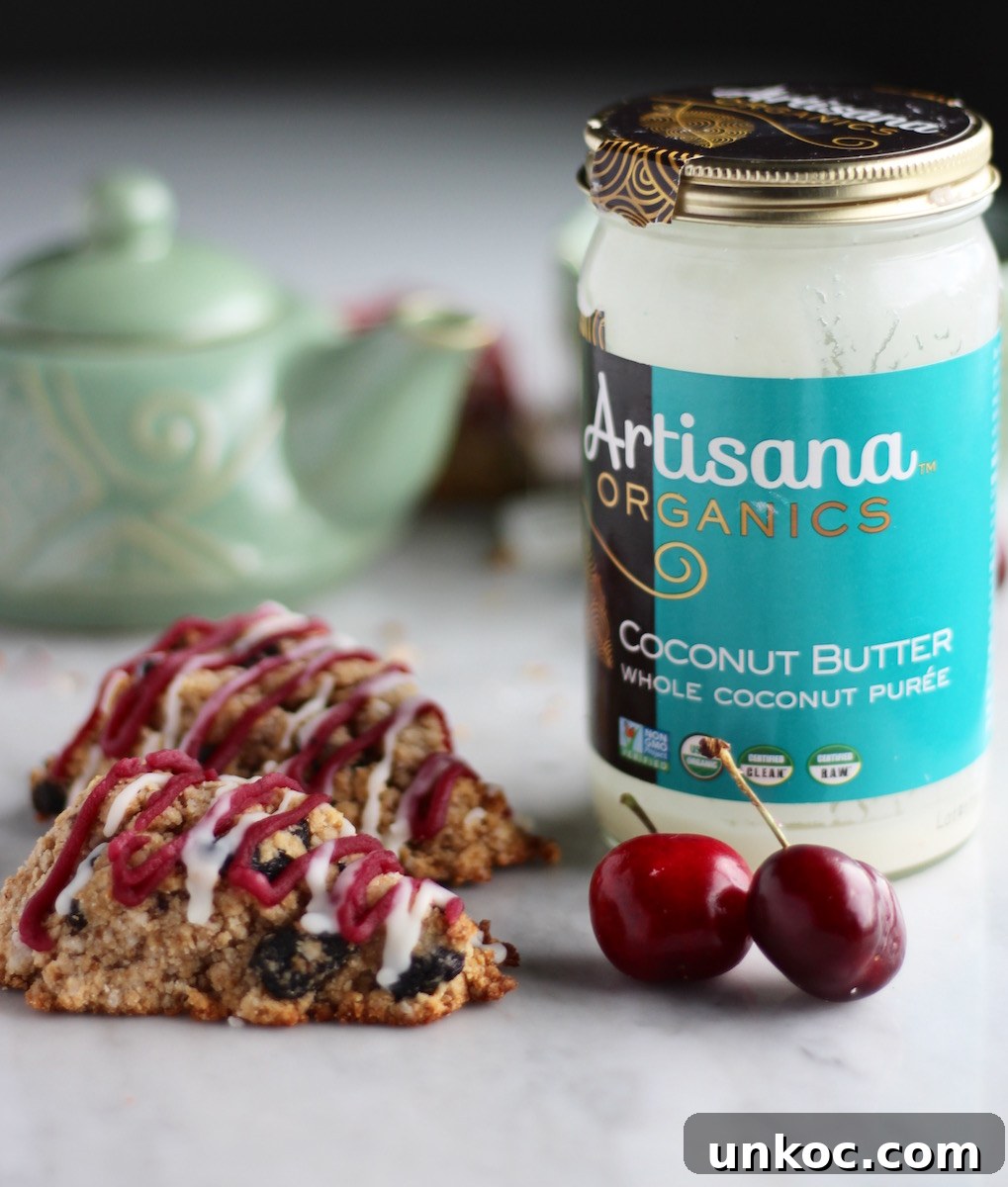 Paleo Frosted Cherry Scones (AIP) - luscious cherry scones have a light almond flavor and are drizzled with cherry and coconut butter frosting! | fedandfulfilled.com