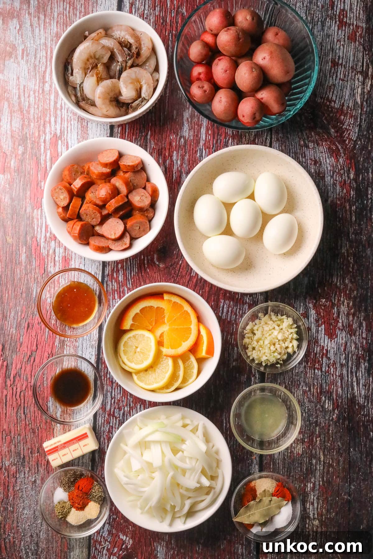 Cajun Shrimp Boil with Corn and Potatoes 3 Shrimp boil ingredients arranged on a table top.