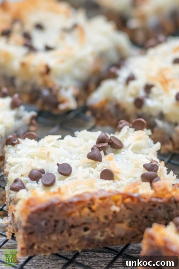 Gluten Free Oatmeal Cookie Magic Bars 2 Oatmeal cookie magic bars cooling on a rack