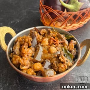 Spicy Sri Lankan brinjal and chickpea curry served in a traditional bowl.