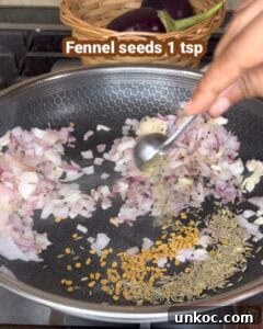 Jaffna Eggplant Chickpea Curry Sri Lankan Brinjal Recipe 18 Sautéing onions, fennel seeds, and spices for Sri Lankan brinjal curry.