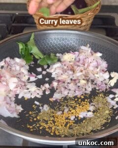 Jaffna Eggplant Chickpea Curry Sri Lankan Brinjal Recipe 19 Sautéed onions, curry leaves, and spices for Sri Lankan brinjal curry.