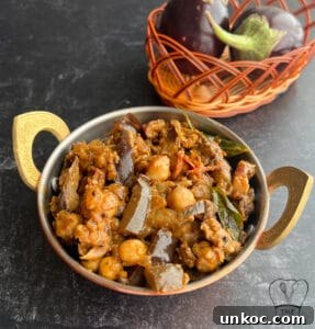 Jaffna Eggplant Chickpea Curry Sri Lankan Brinjal Recipe 4 An authentic Sri Lankan brinjal curry with chickpeas, spices, and vegetables, served in a traditiona.