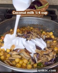 Delicious Sri Lankan brinjal curry cooked with coconut milk, eggplant, and spices. Perfect for a tra.