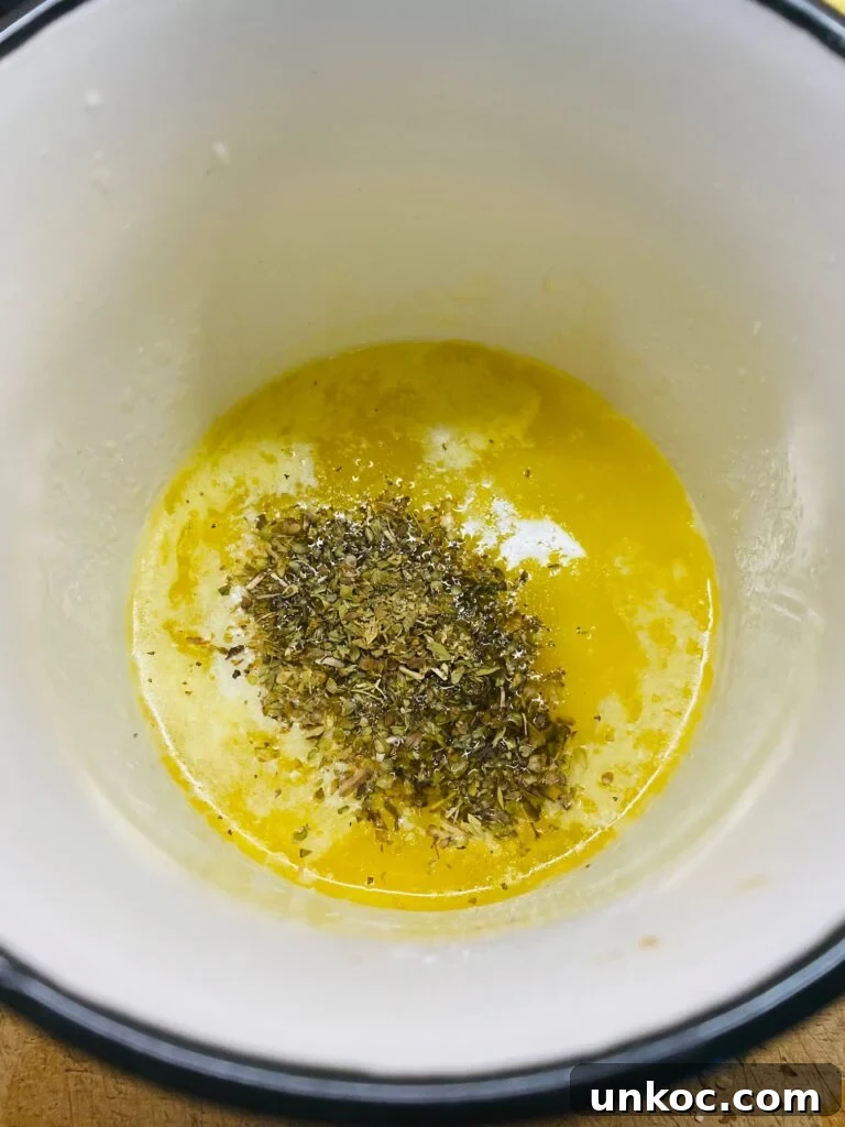 Crispy Air Fryer Lemon Salmon with Roasted Broccoli 4 adding seasoning to the melted butter