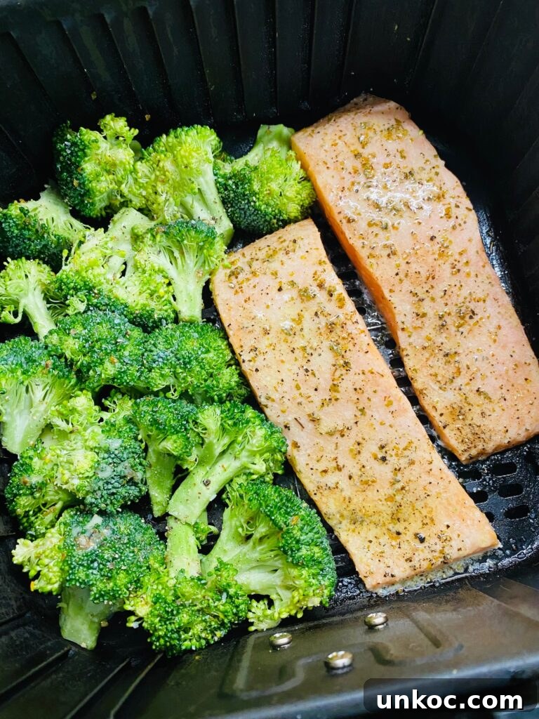Crispy Air Fryer Lemon Salmon with Roasted Broccoli 6 Air Fryer Lemon Salmon and Broccoli before cooking