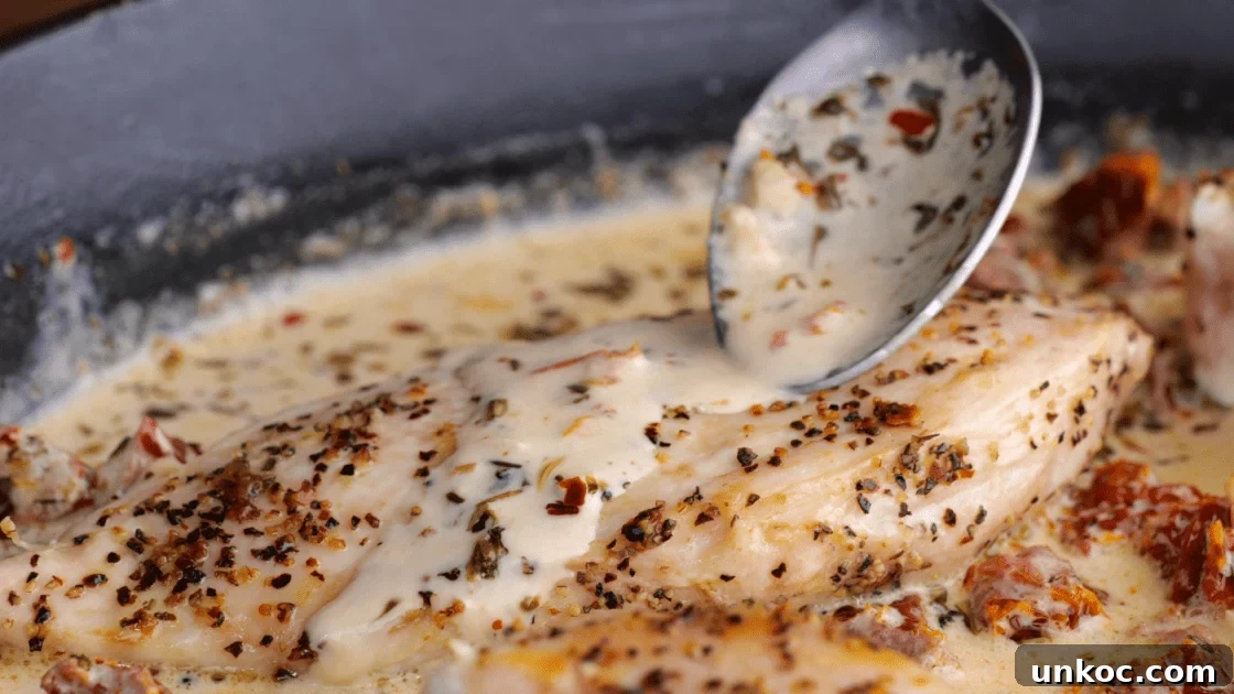 Add cooked chicken to skillet and cover in the sauce.