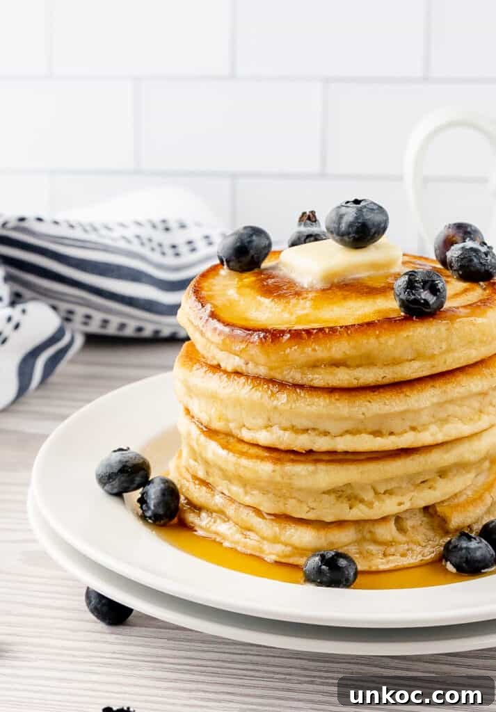 Fluffy Oat Milk Pancakes Recipe 5 A plate of oat milk pancakes