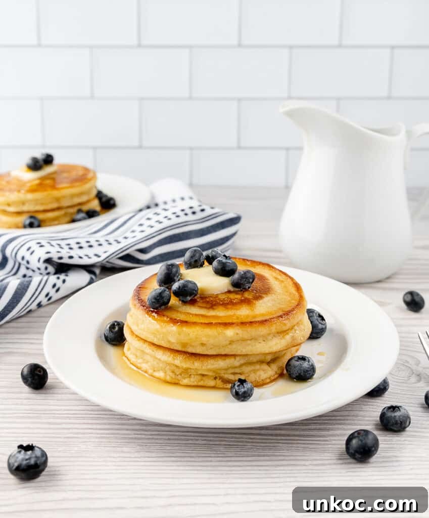 Fluffy Oat Milk Pancakes Recipe 6 A plate of oat milk pancakes
