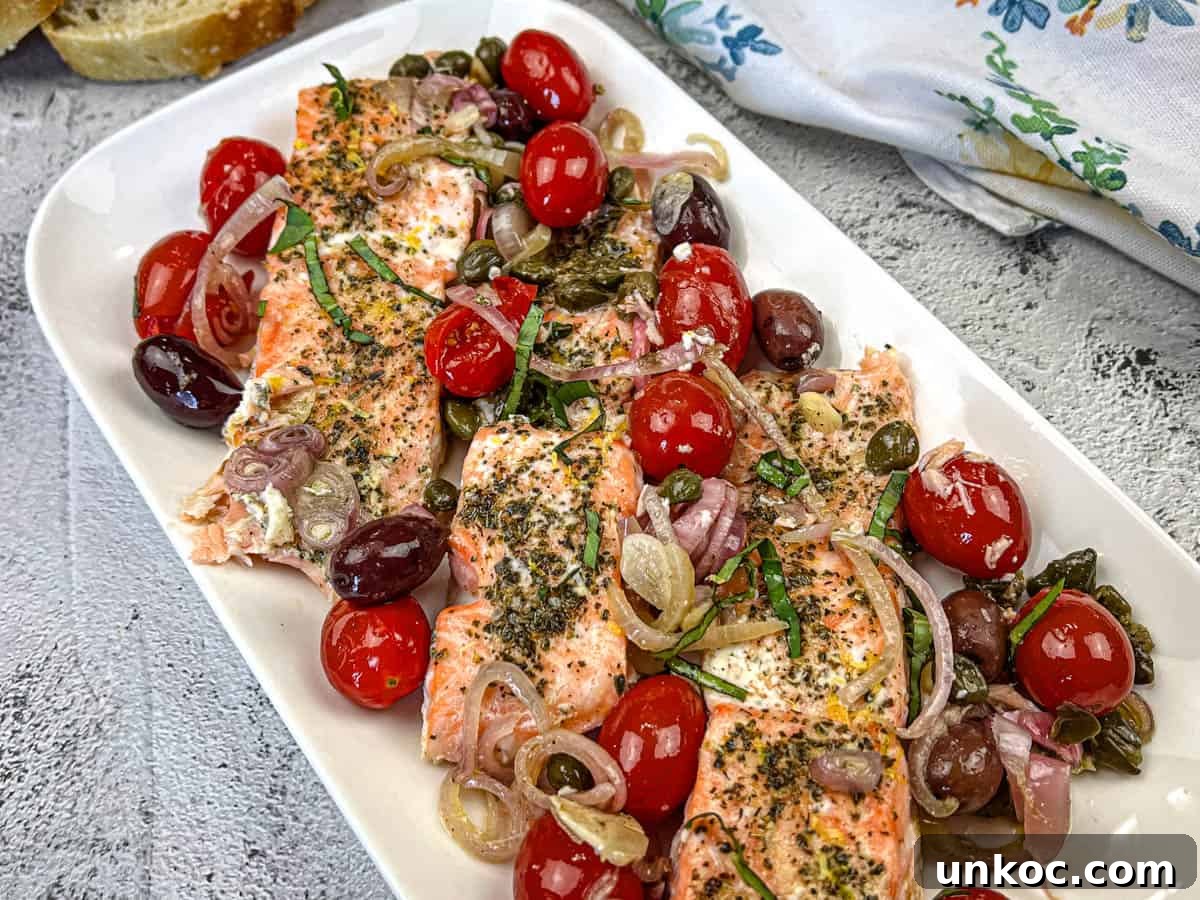 Mediterranean Salmon on a white rectangular plate.