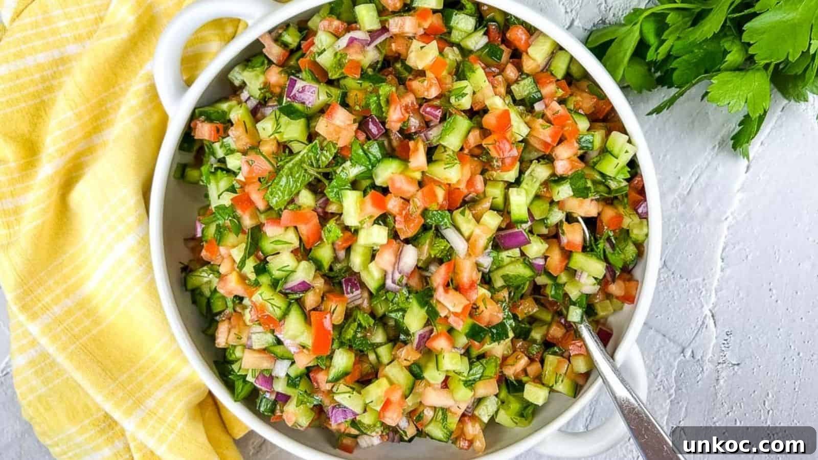 Shirazi Salad in a white serving bowl.