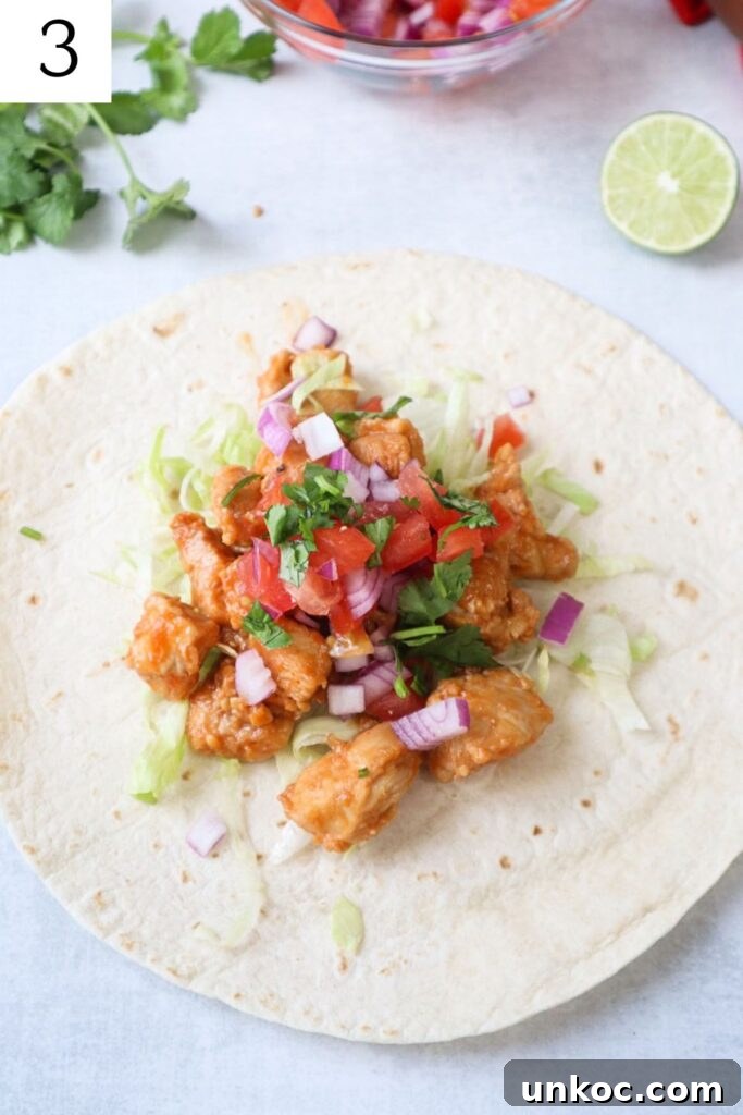 30 Minute Sriracha Chicken Wraps 6 tortilla with sriracha chicken, tomatoes, onion, cilantro, and lettuce.